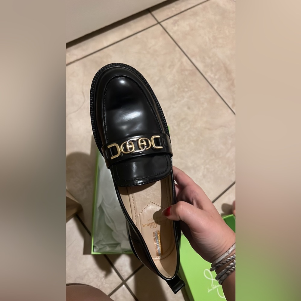 Black Sam Edelman loafers with gold and silver detail